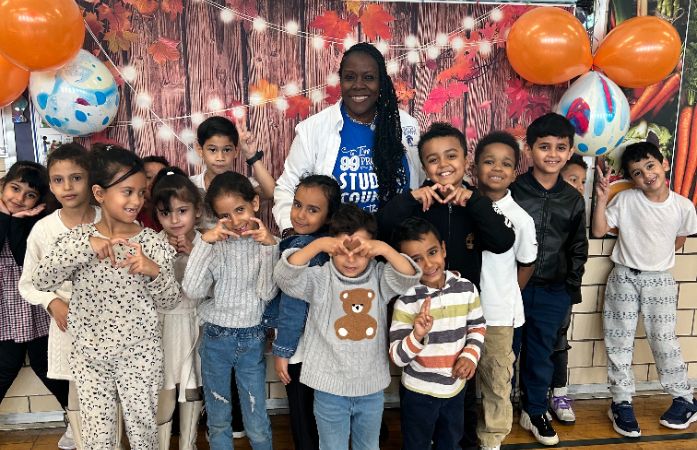  group of students posing with school dean